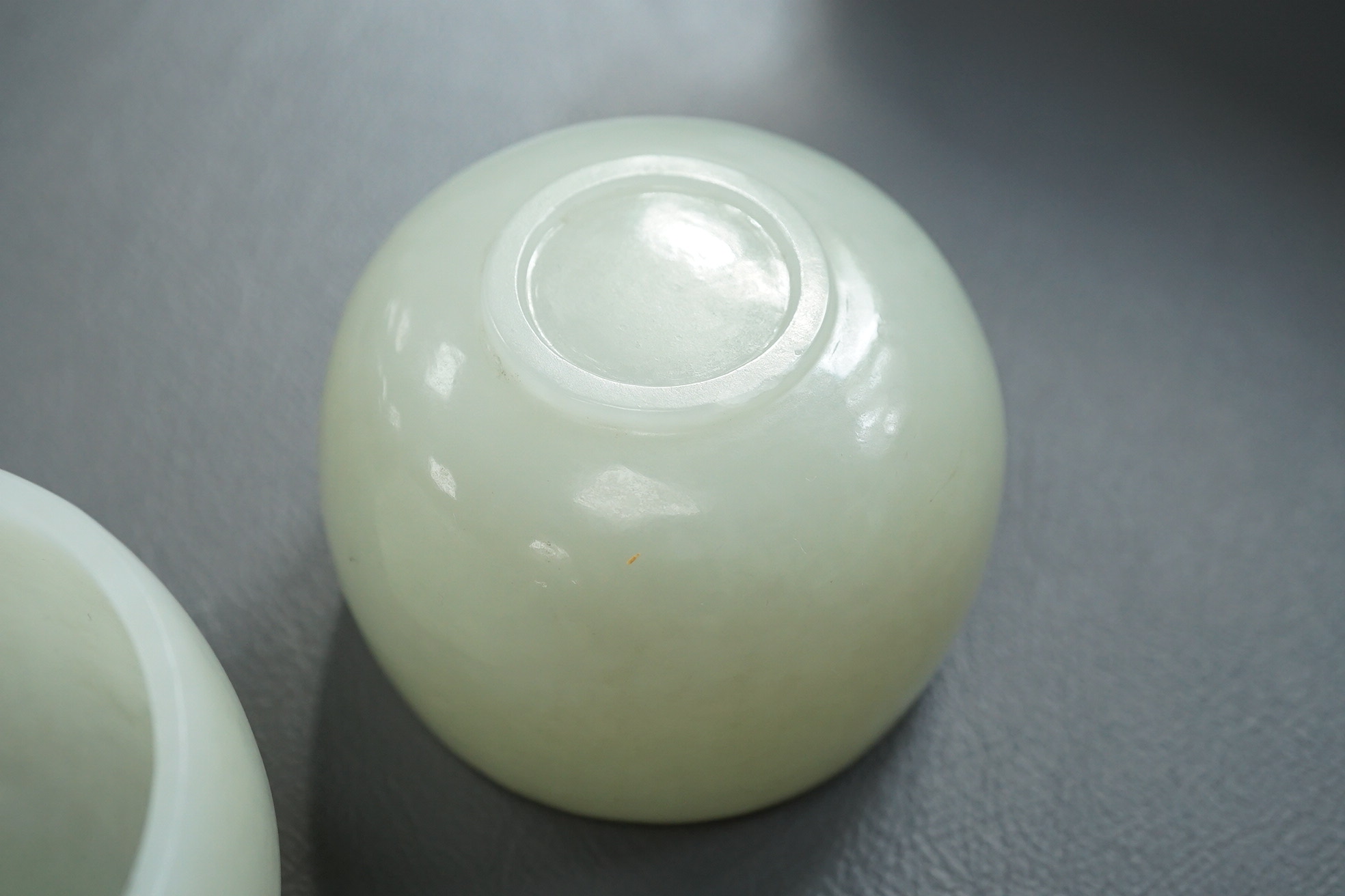 A pair of Chinese white jade cups, Qing dynasty or later